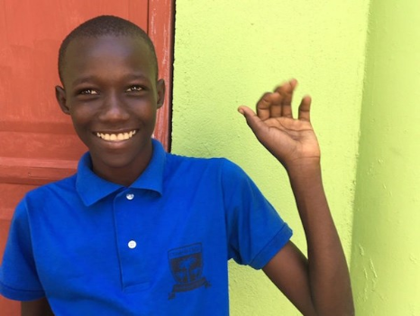 Student wearing blue polo shirt